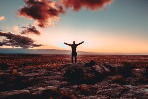 Person praying with open Bible - Bible study on overcoming anxiety with prayer