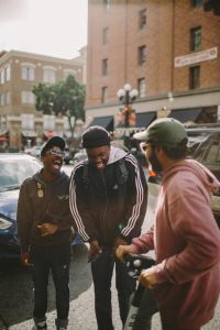 Two young people talking and laughing together - youth Jonathan and David friendship Bible study