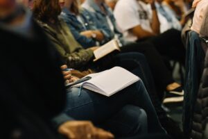 Bible study group in prayer and worship